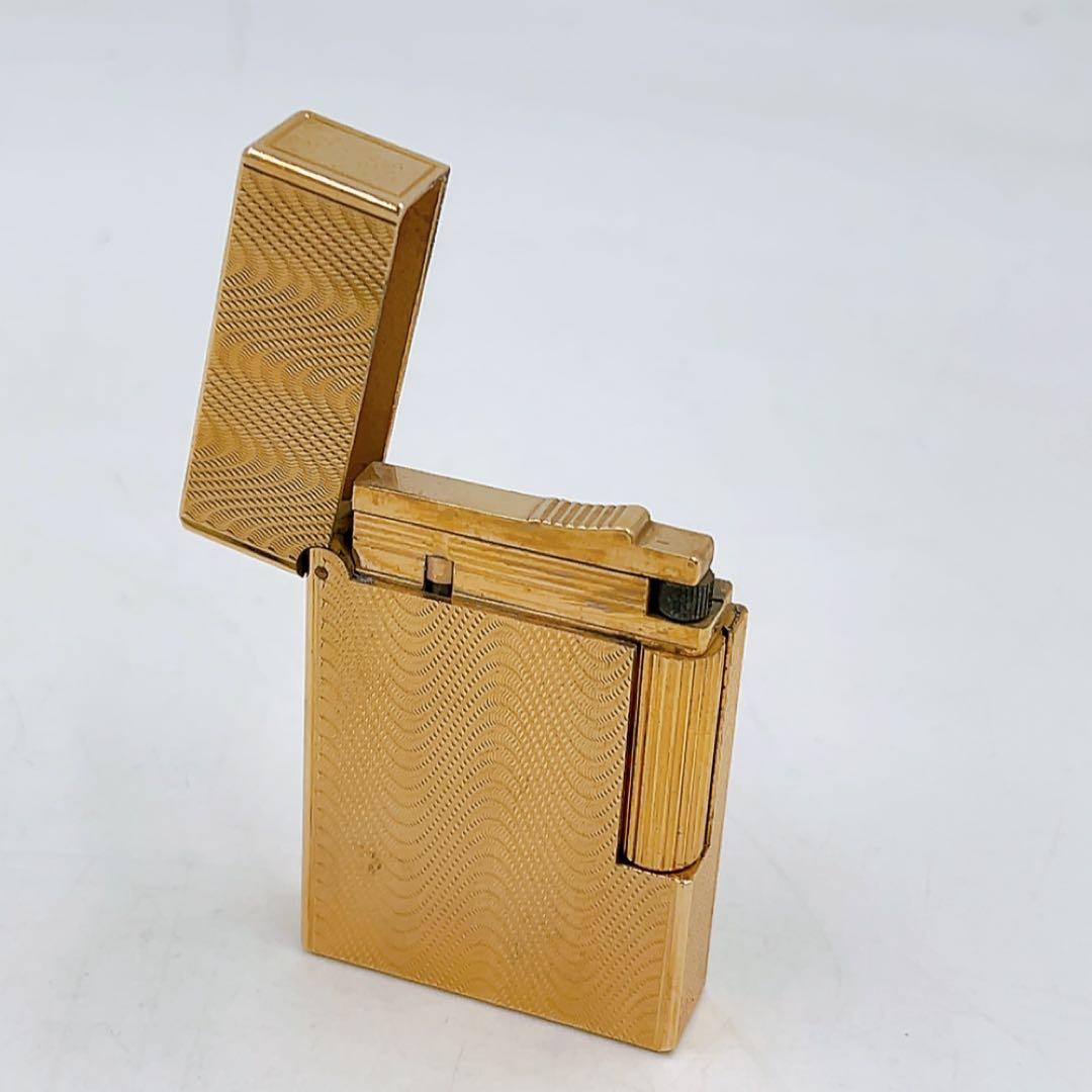 12AB038 S.T.DUPONT ライター 金色 ライン2 火花OK 波模様