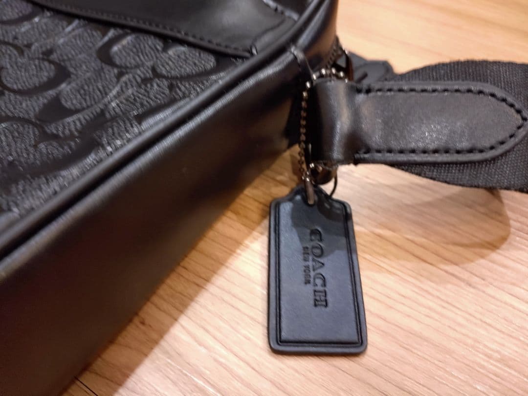 COACH シグネチャーレザー フライトバッグ