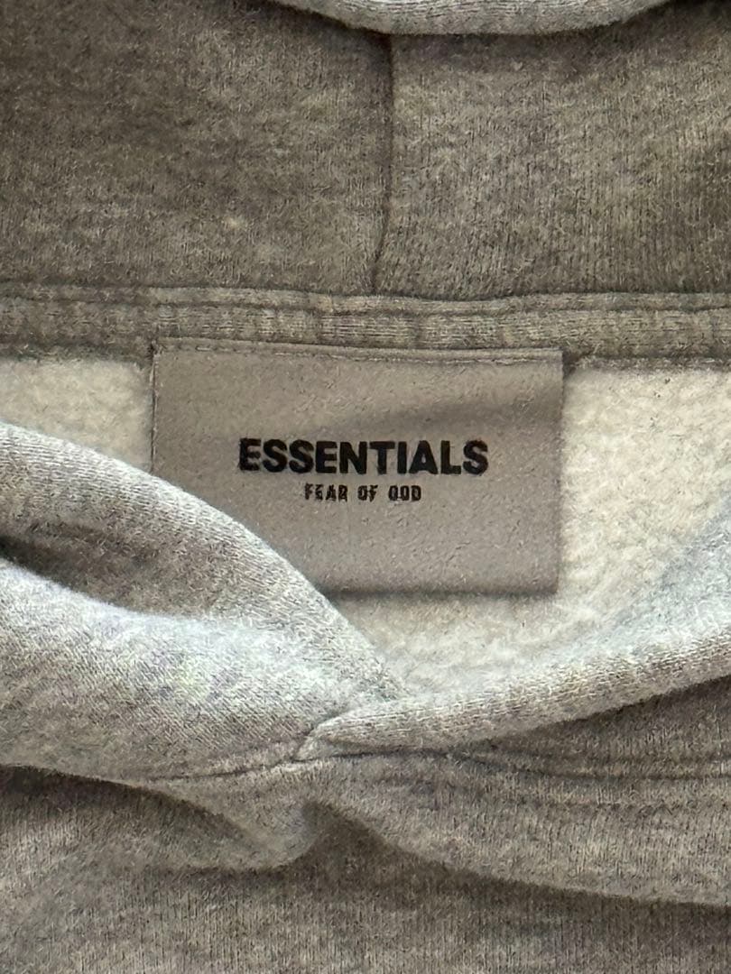 ESSENTIALS グレー フード付きパーカー