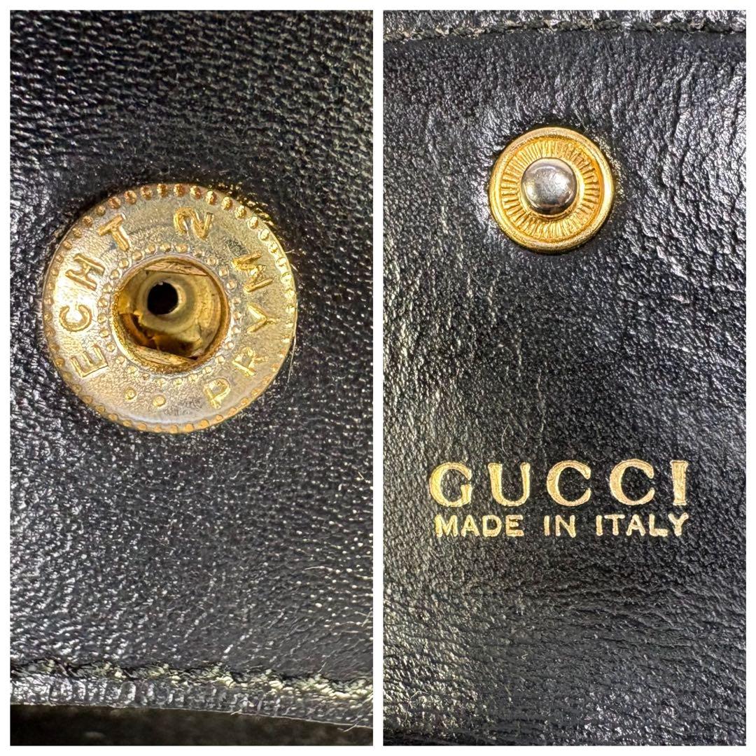 美品　グッチGUCCI ケース　カードお札　黒レザー フラップ式 ロゴ刻印
