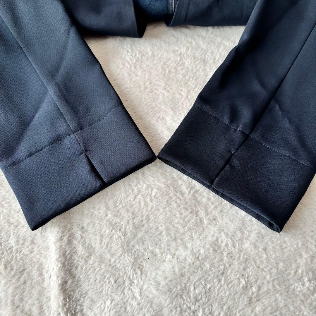 ナチュラルビューティーベーシック ノーカラー パンツスーツ ネイビー L 紺