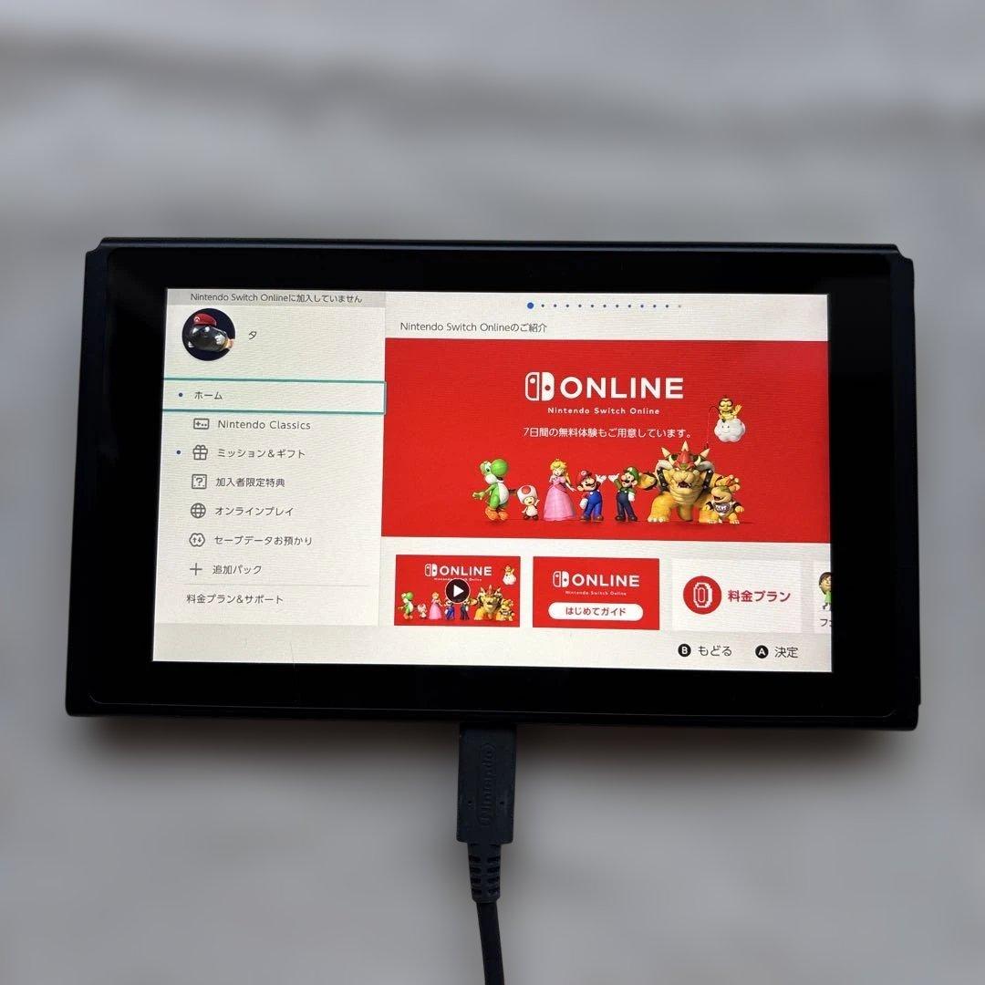 Nintendo Switch (ケースに割れあり)