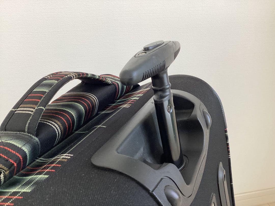 美品　DAKINE チェック柄 キャリーケース40L T字ハンドル