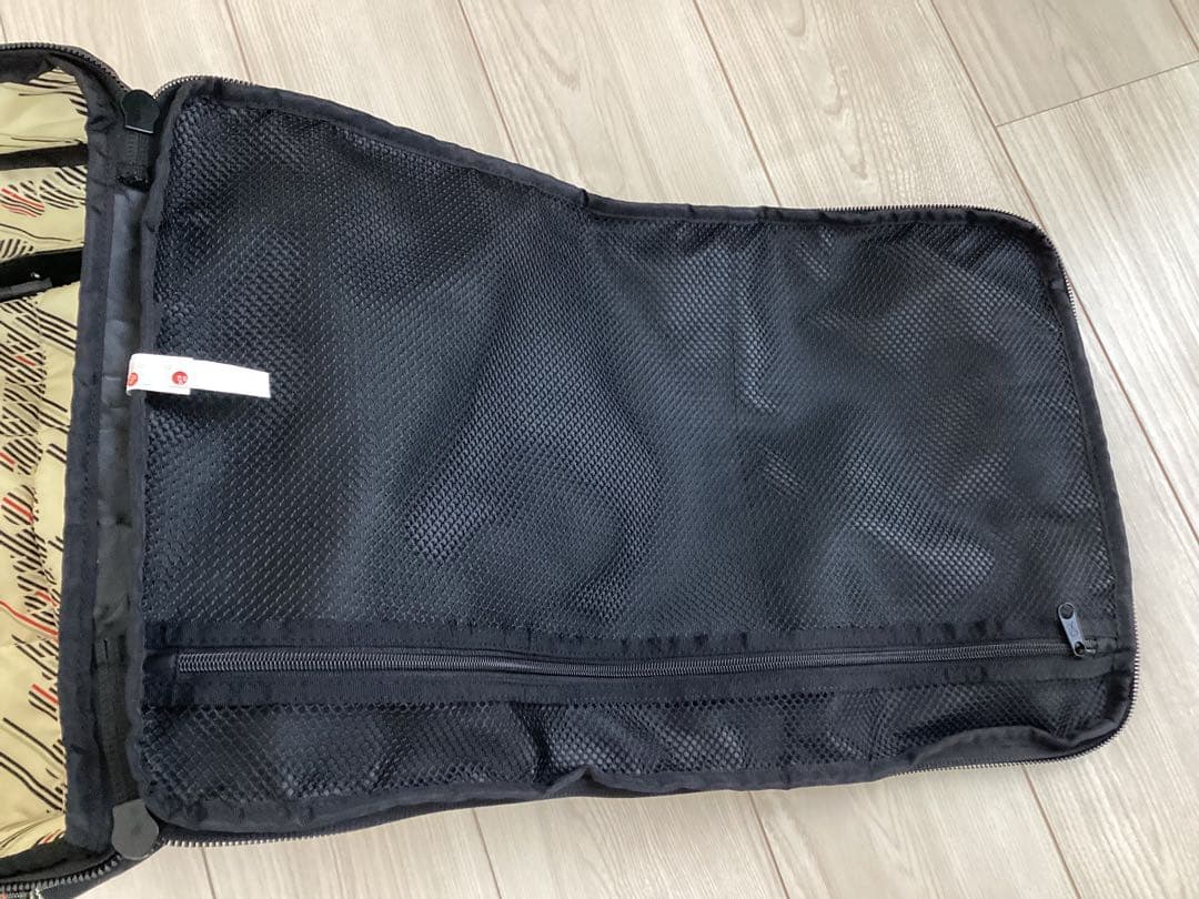 美品　DAKINE チェック柄 キャリーケース40L T字ハンドル