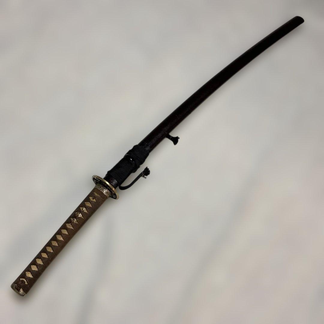 長めの居合刀 灰茶柄 龍彫金縁丸鍔 焦茶梨地鞘