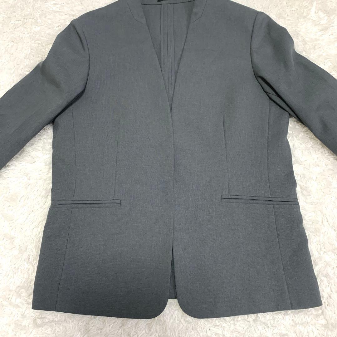 トミPLST ノーカラージャケット パンツ セットアップ