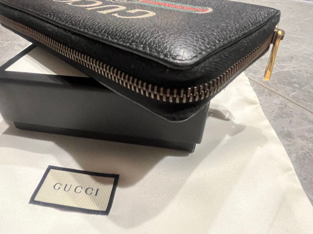 GUCCI ブラック 長財布 ロゴ入り ロゴプリント