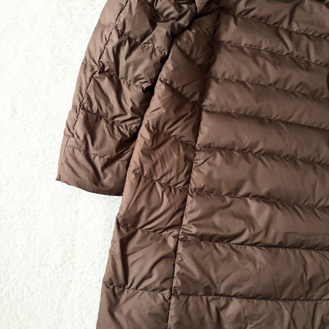 5552 美品✨ モンベル トラベルダウンロングコート L ブラウン 収納袋付き