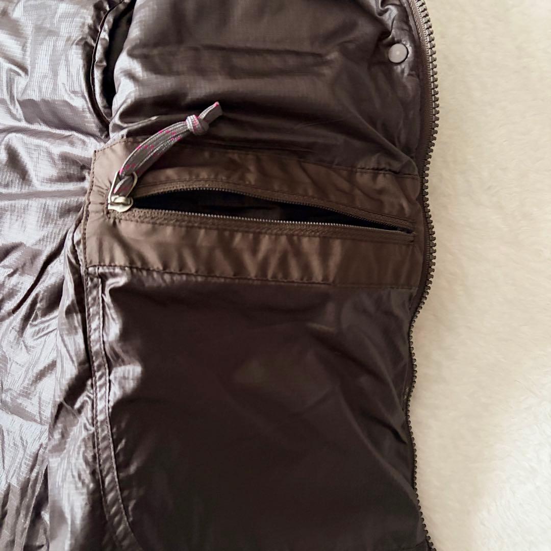 5552 美品✨ モンベル トラベルダウンロングコート L ブラウン 収納袋付き