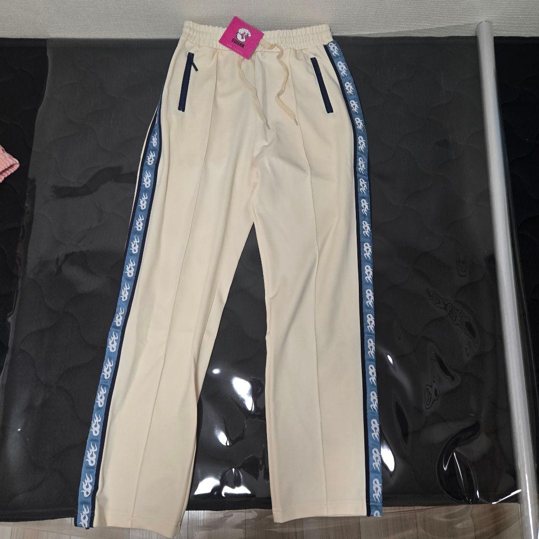 トップス SWANK TRACK SET CREAM