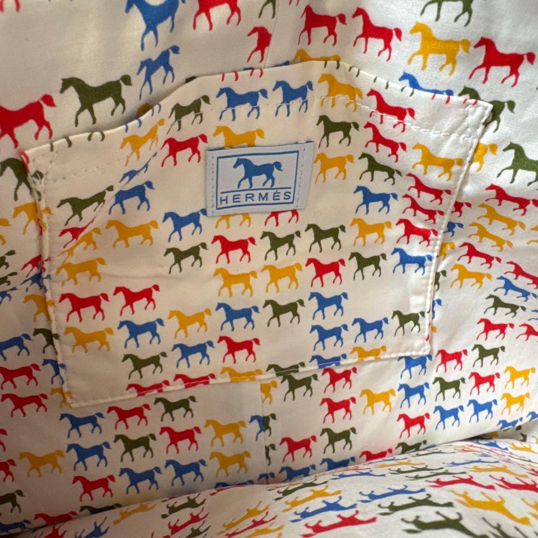 HERMES ベビーリュック　青と赤のストライプ