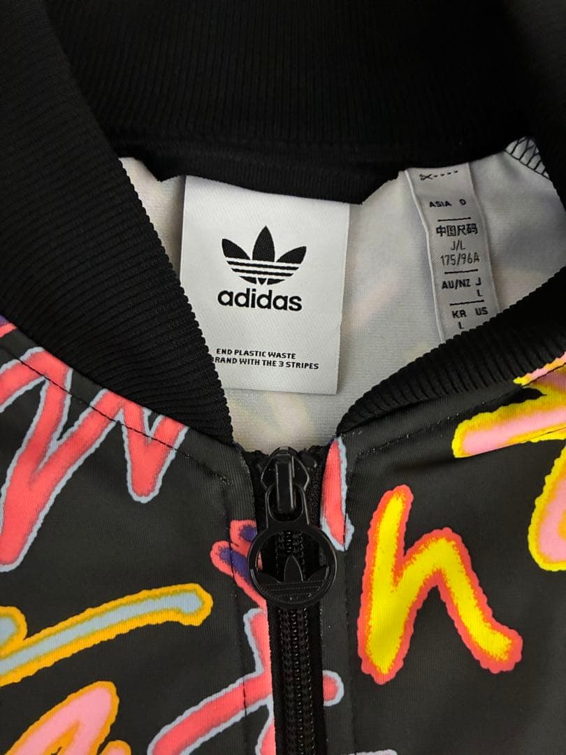 adidas LOVEUNITESTPカラフルジャージセットアップ