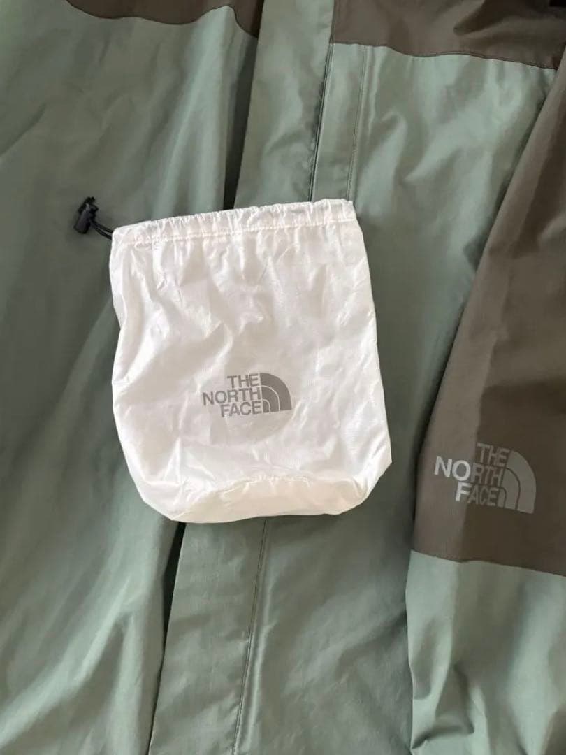 THE NORTH FACE タグアンポンチョコート
