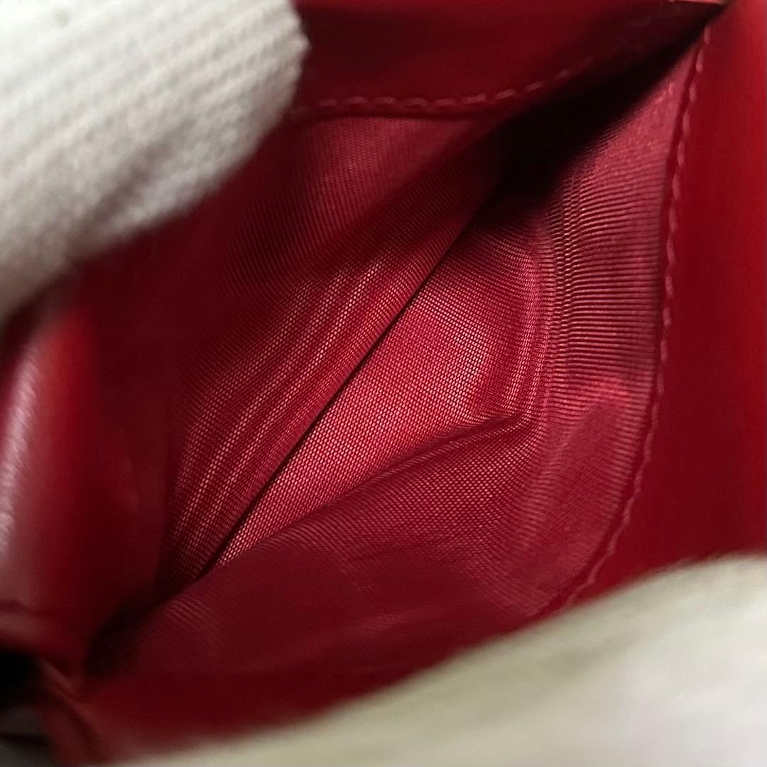 PRADA プラダ　折り財布　ゴールドロゴ　シボ革　バイカラー　赤　黒