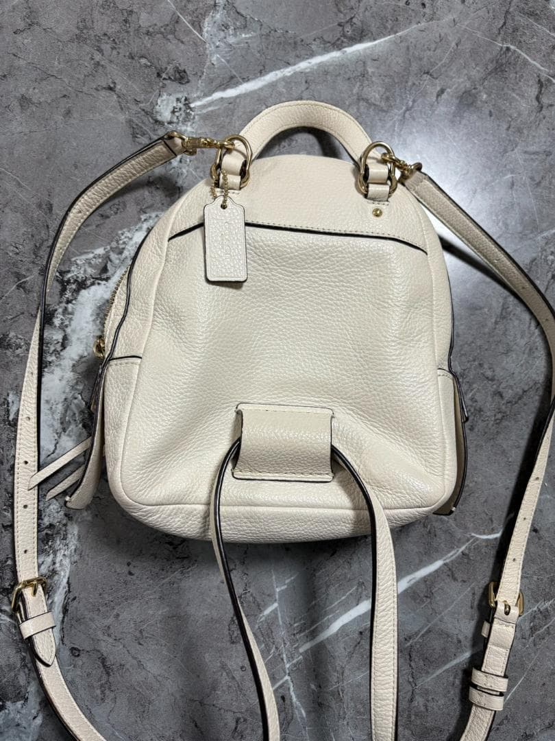 パパイヤ　COACH ホワイト バックパック