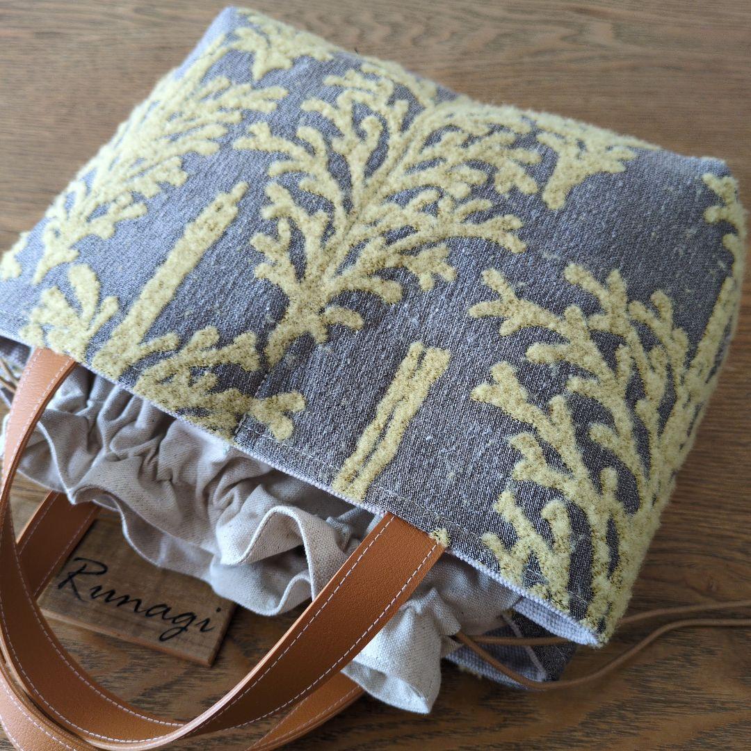 あおりポケットのあおりポケットの巾着バッグ＊ミナペルホネン metsa