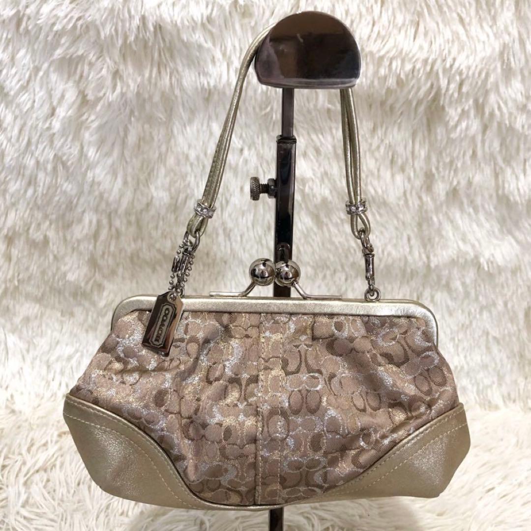 コーチ レザー ミニ ハンドバッグ シグネチャー キャンバス ガマ口