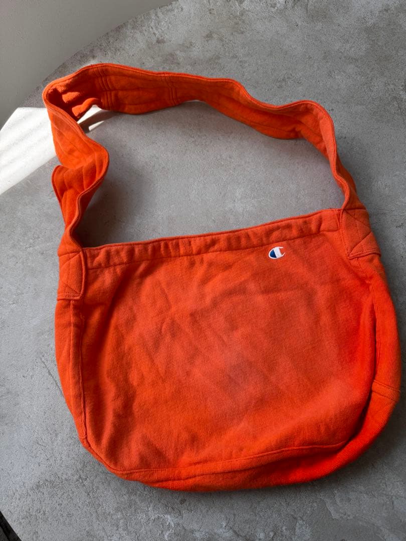 ヴィンテージリメイクChampion ニュースペーパーバック　オレンジ