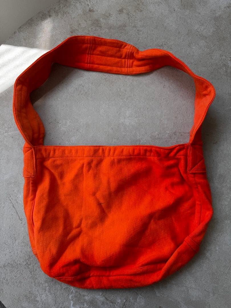 ヴィンテージリメイクChampion ニュースペーパーバック　オレンジ