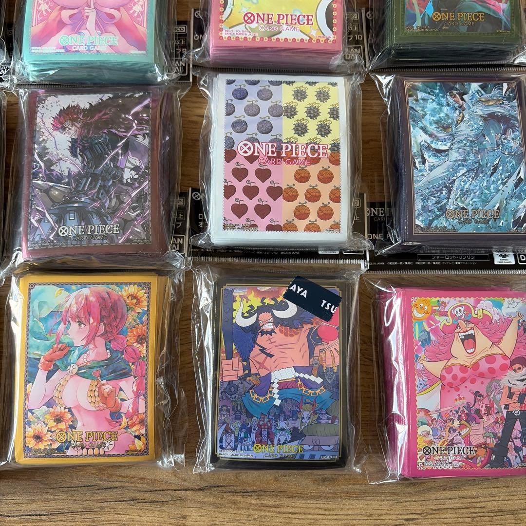 ワンピースカード　公認店　オフィシャルスリーブ　ルフィ　ゾロ　他　23個セット