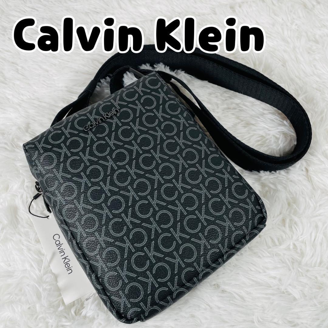 新品未使用 カルバンクライン クロスボディバッグ ショルダー 総柄 ブラック