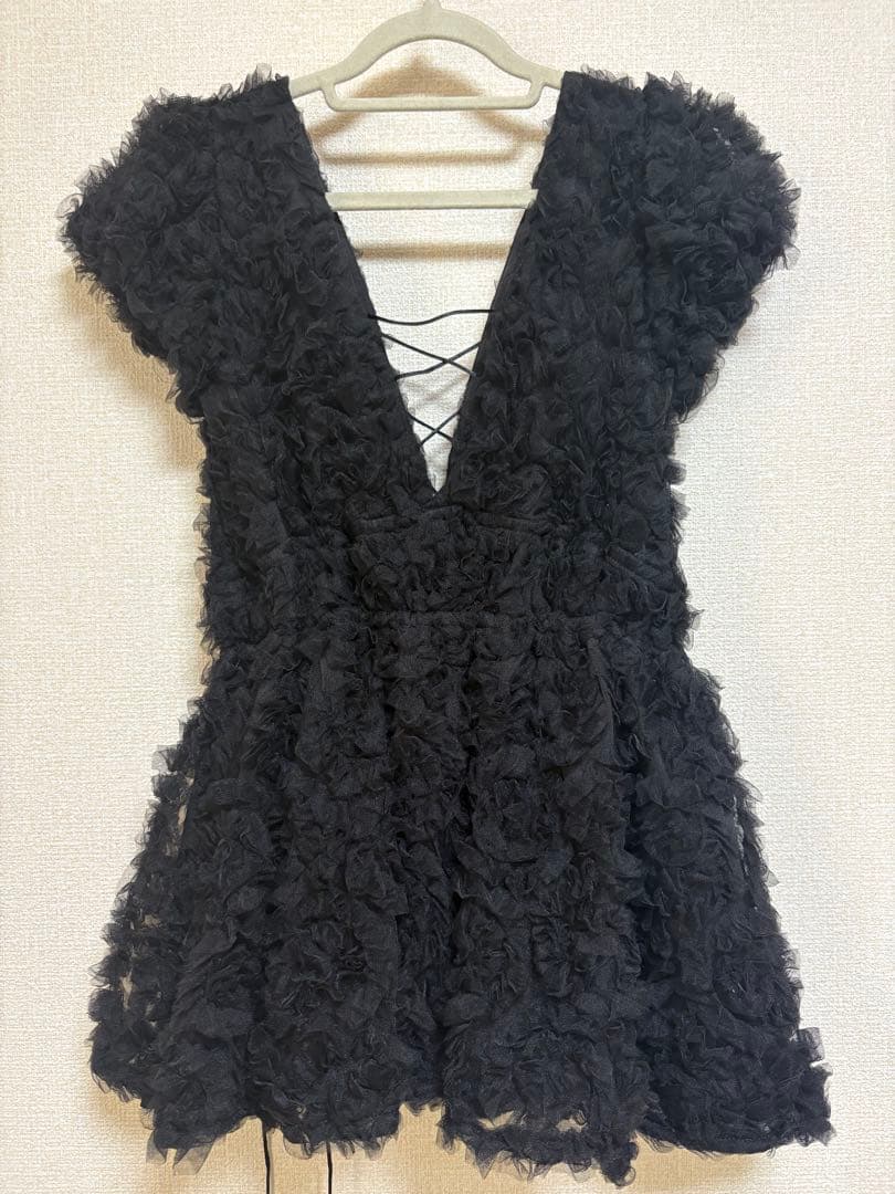 【poláura】フラワーぺプラムバックリボンチュニック