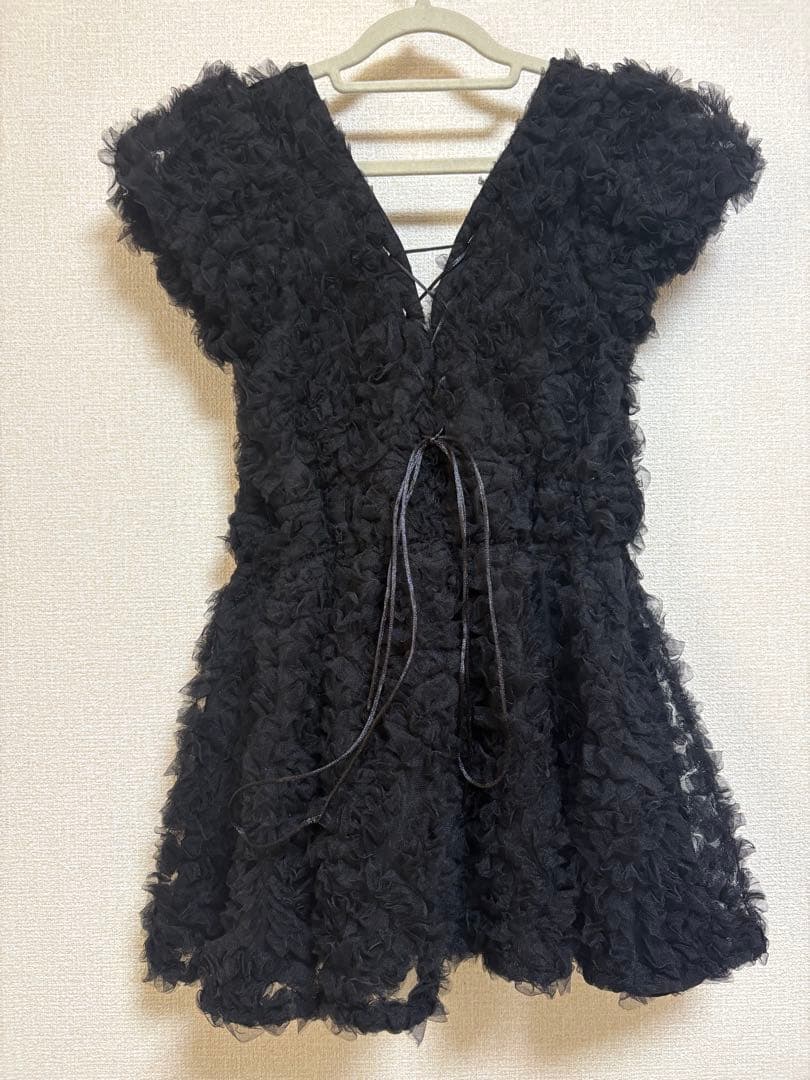 【poláura】フラワーぺプラムバックリボンチュニック