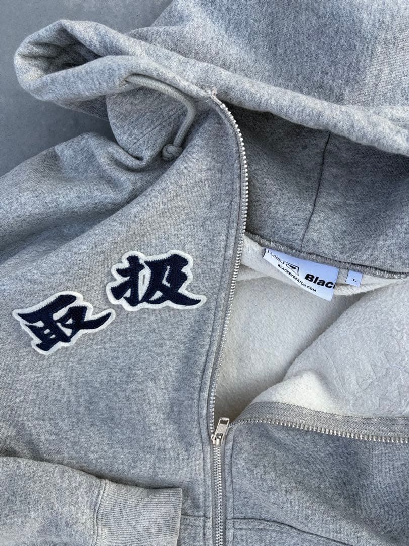 Black eye patch ZIPフーディー　取扱注意