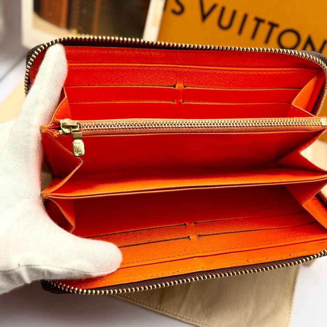ルイヴィトンモノグラム　グラフィティオランジュ　ジッピーウォレット　M93711