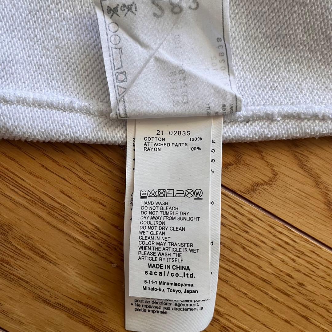 sacai × KAWS パーカー