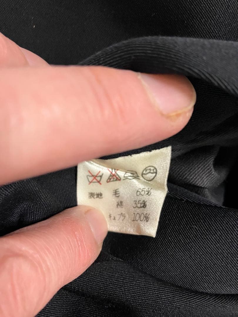 イッセイミヤケ 黒のブレザー フレア裾デザイン