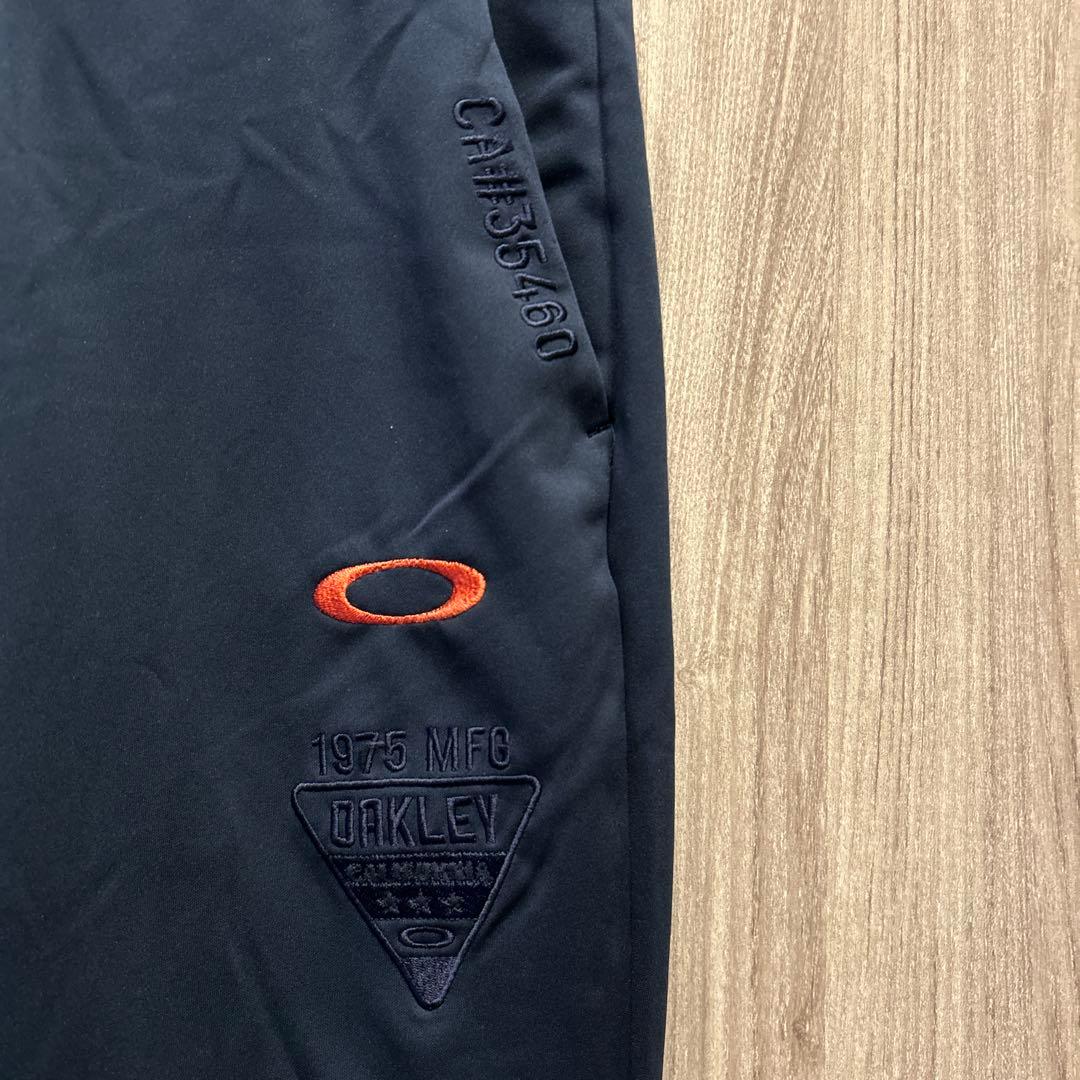 【美品】OAKLEY ゴルフウェア 上下セットアップ ジャージ 刺繍ロゴ 古着