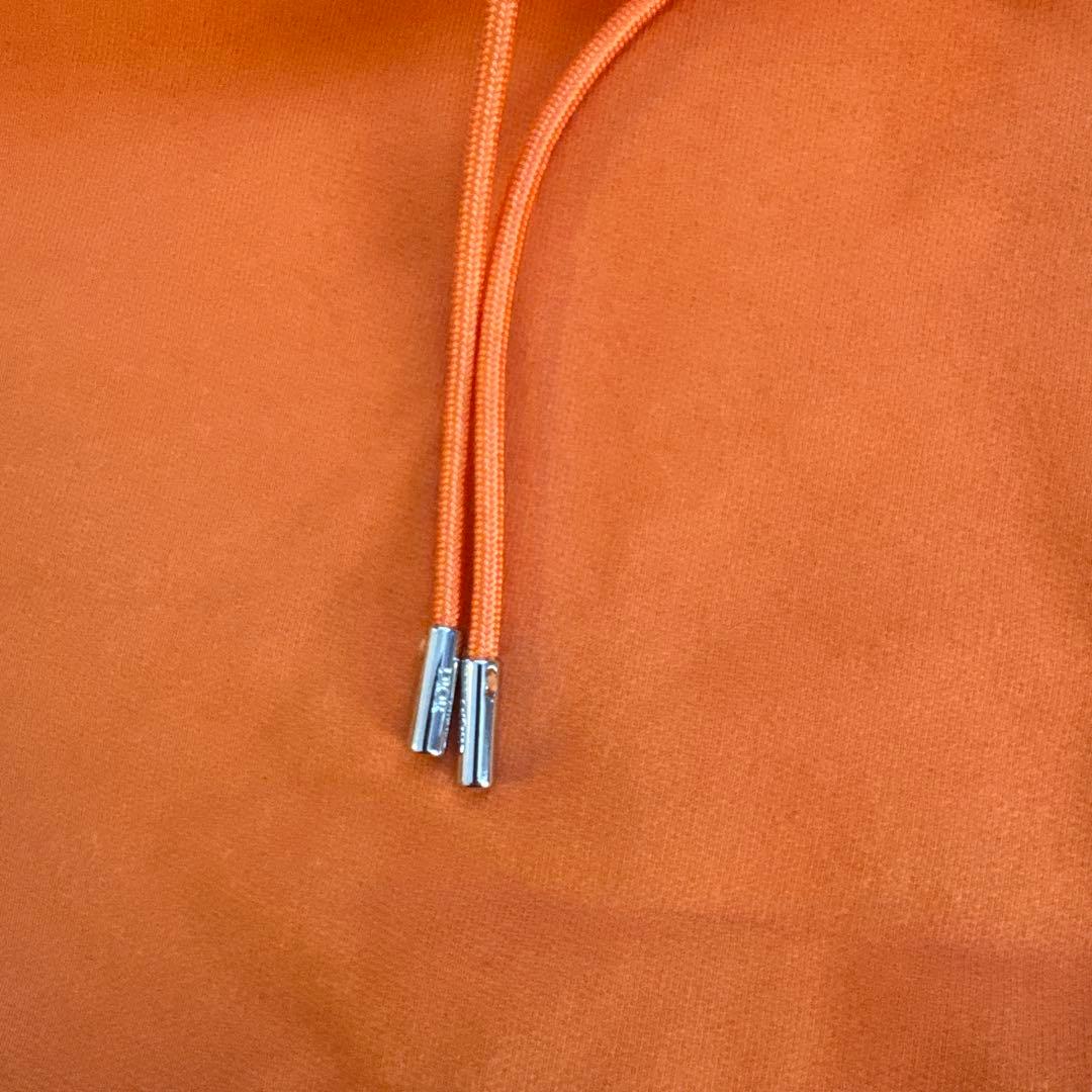 CDロゴ刺繍オレンジパーカー