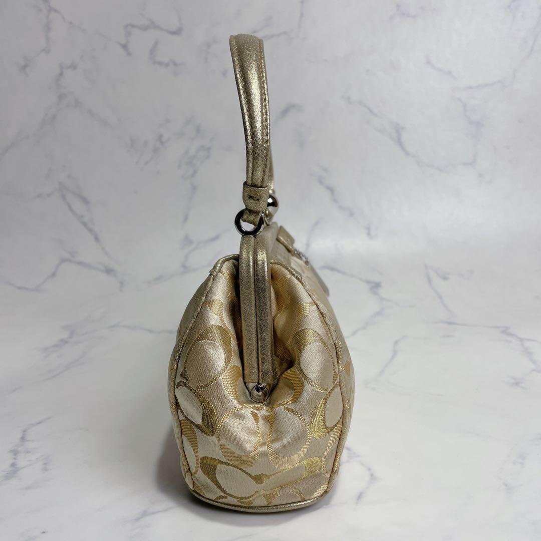 新品同様✨COACH アクセサリーポーチ がま口 シグネチャー イエローゴールド