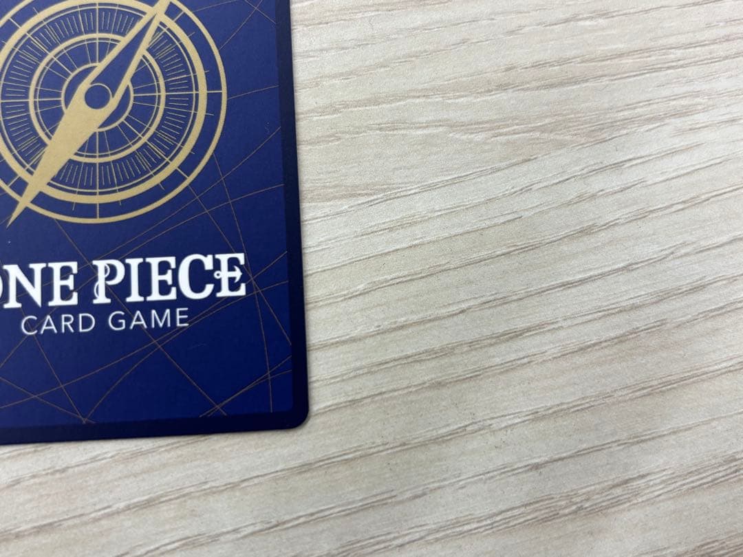 ワンピースカード サンジ コミパラ OP06-119 スーパーパラレル