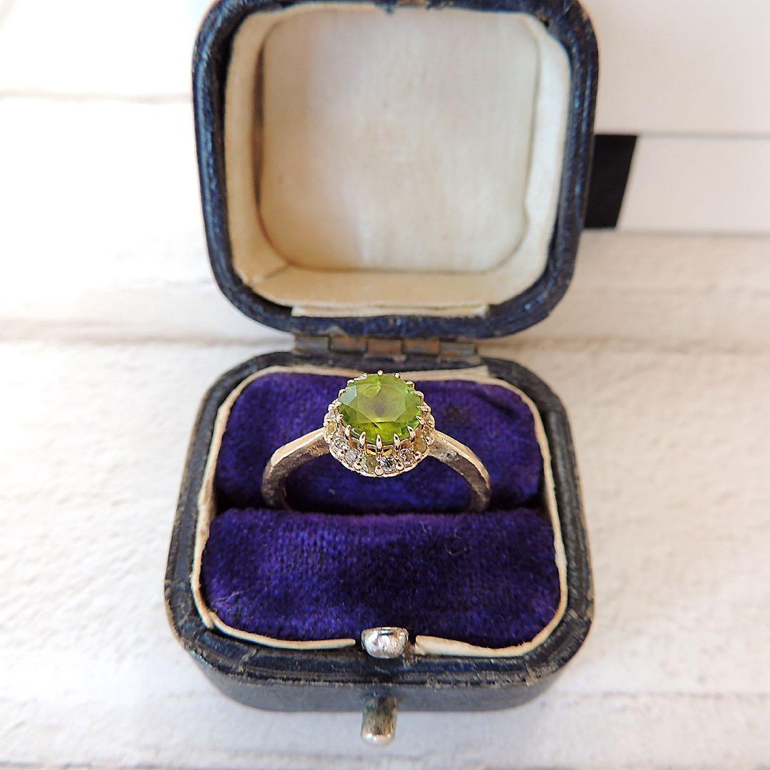 パーセルジュエリー ペリドット ポンポネアンスールリング 11号
