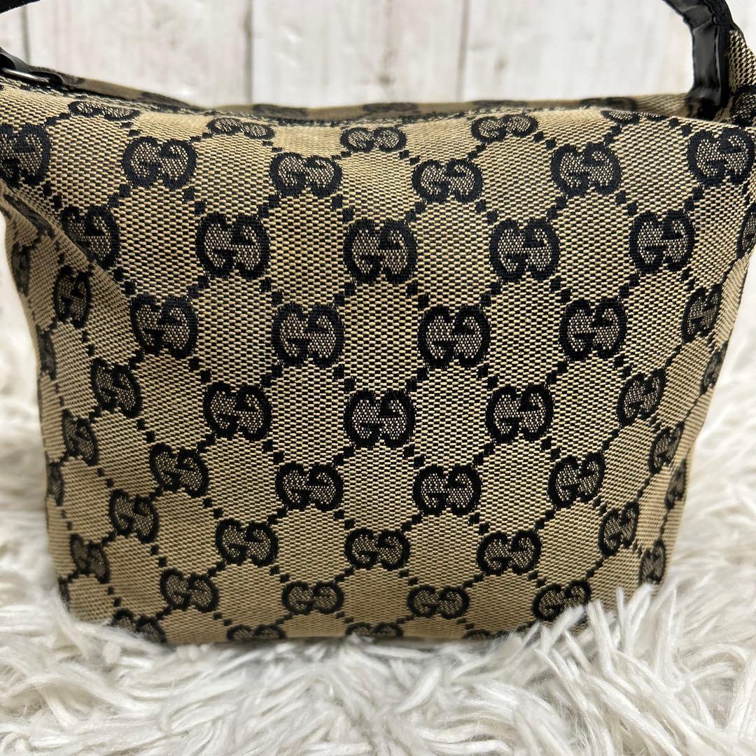 GUCCI アクセサリーポーチ　GGキャンバス ポーチ ハンドバッグ レザー