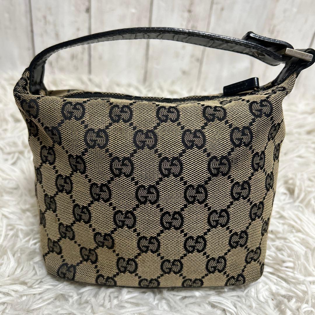 GUCCI アクセサリーポーチ　GGキャンバス ポーチ ハンドバッグ レザー