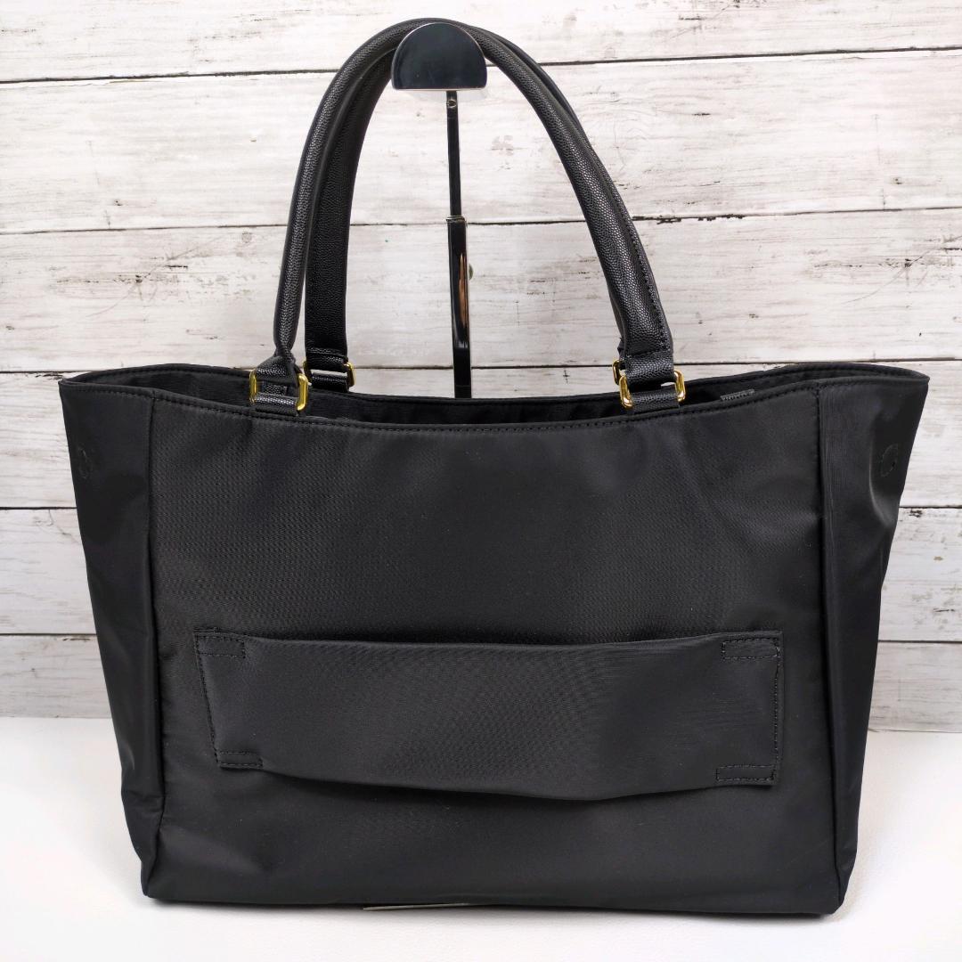 hitomi TUMI ヴァレッタ トートバッグ ビジネスバッグ 自立