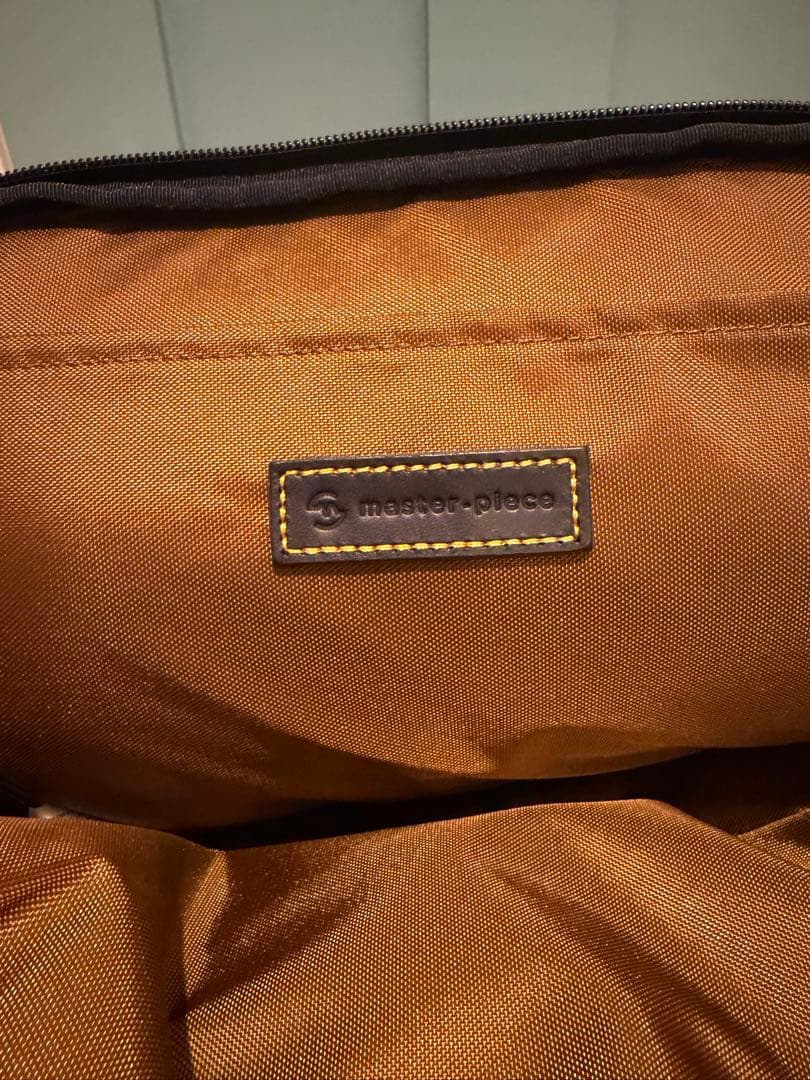 NANGA × master piece hand warmer bag