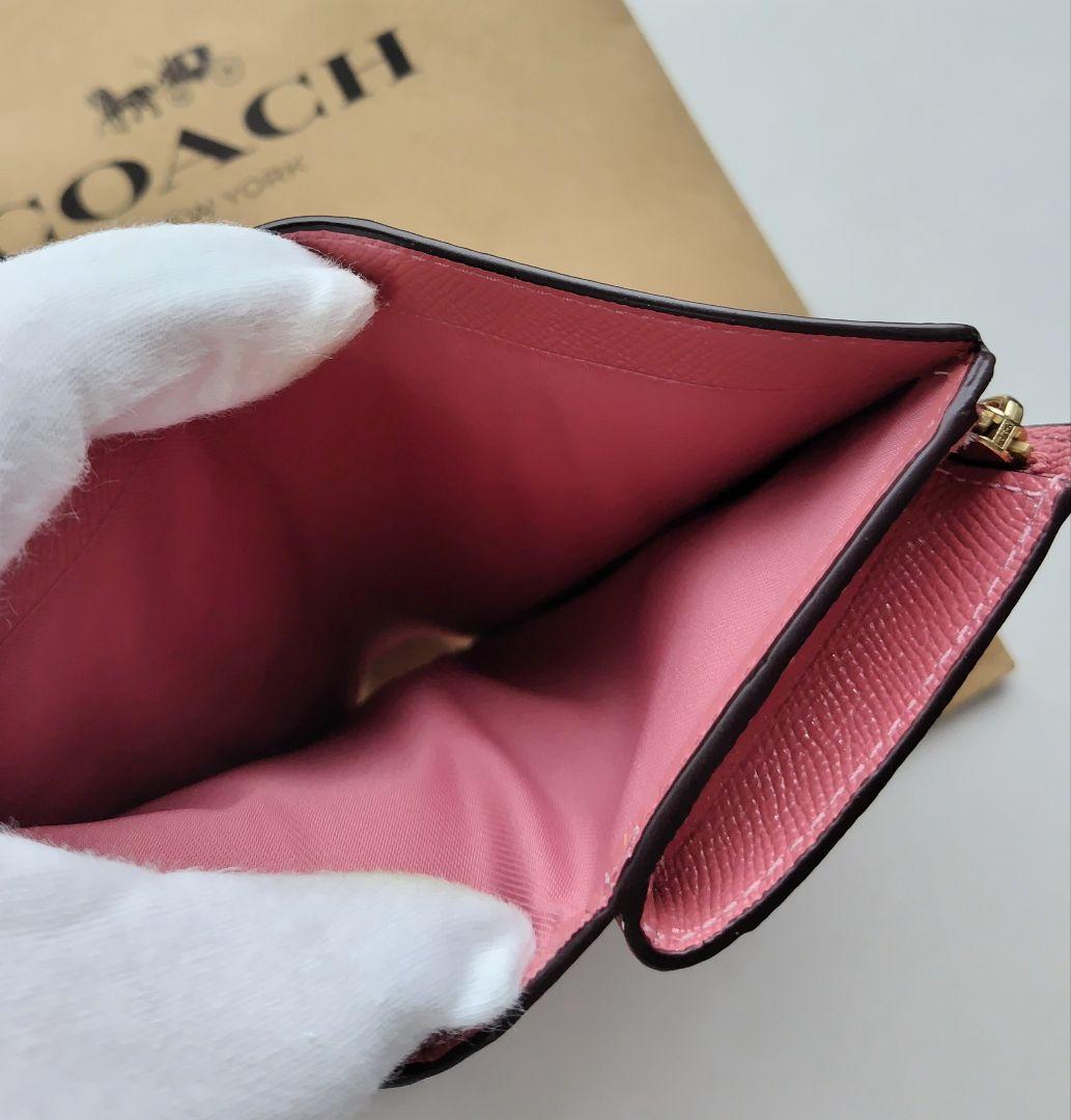 【新品】COACH コーチ 二つ折り財布 シグネチャー ピンク　レザー