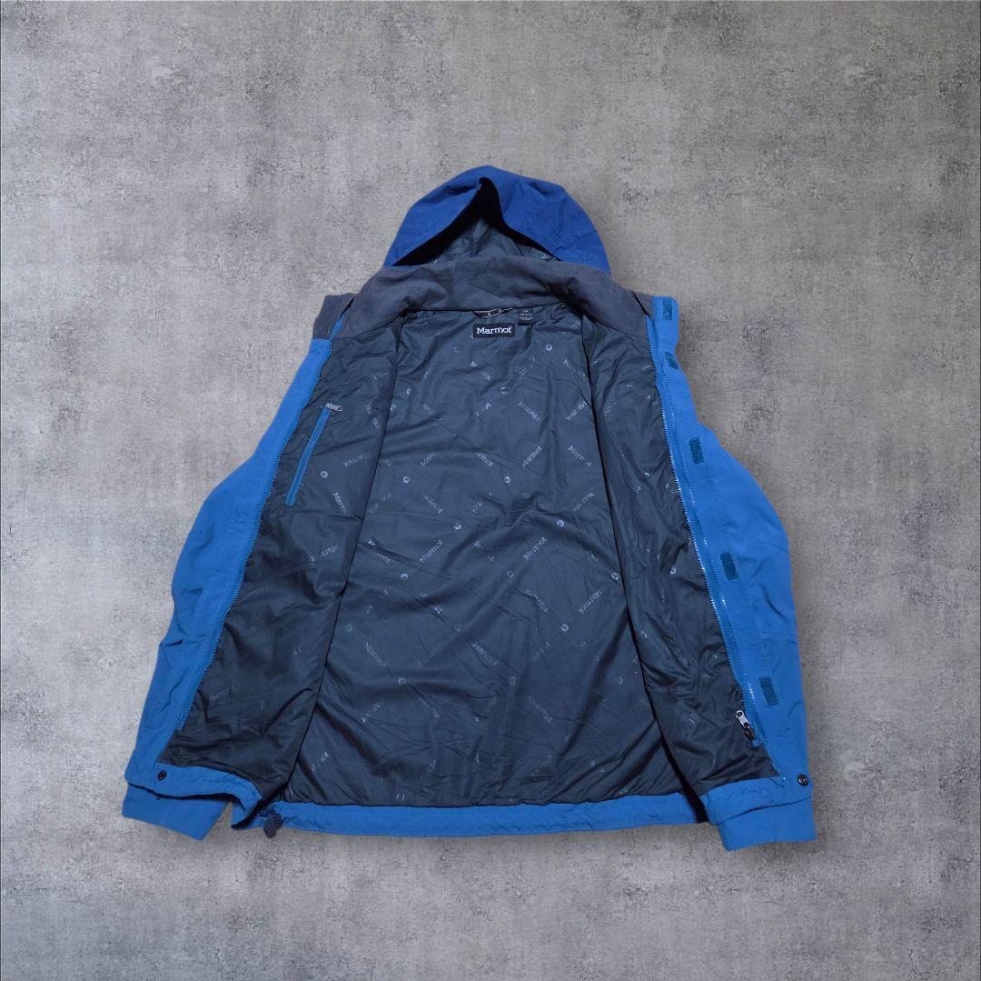美品 テック系古着Marmotマウンテンパーカー現行ブルーネイビードローコードL