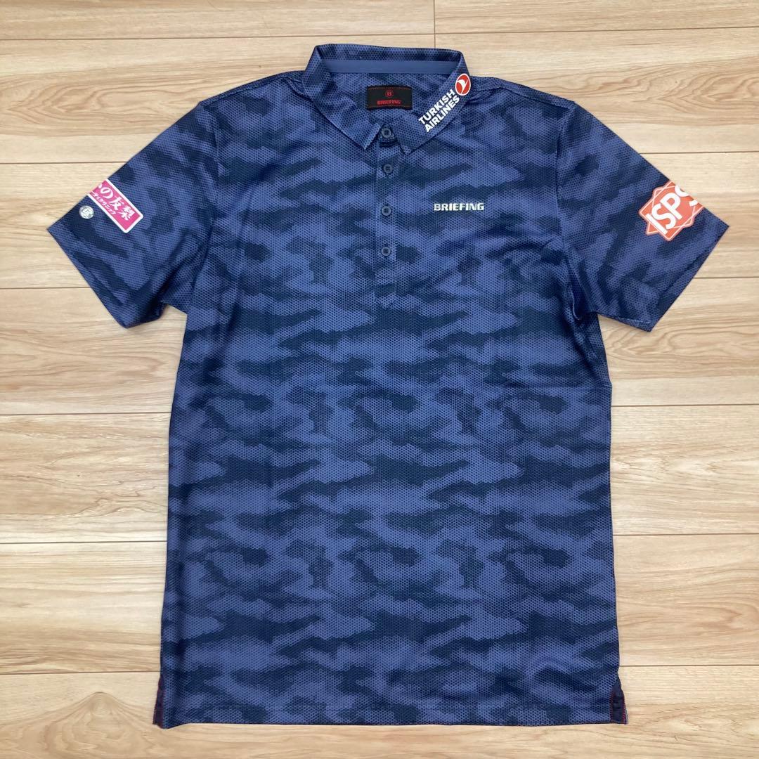ゴ*ン様 BRIEFING ポロシャツ メンズ カモフラ柄 企業ロゴ入