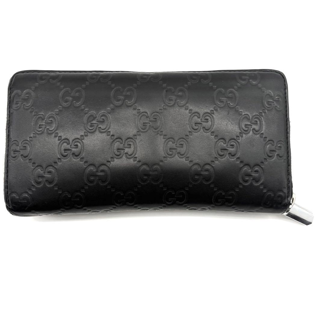 GUCCI　長財布　シマ　レザー　黒　ラウンドファスナー　GG柄　エンボス