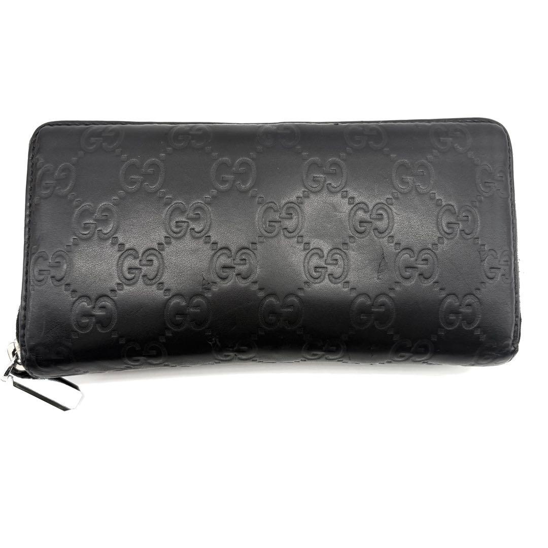 GUCCI　長財布　シマ　レザー　黒　ラウンドファスナー　GG柄　エンボス