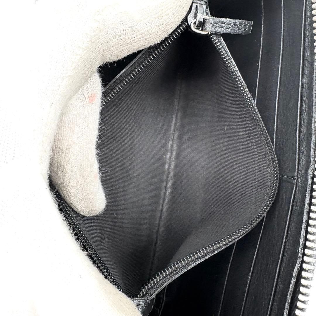 GUCCI　長財布　シマ　レザー　黒　ラウンドファスナー　GG柄　エンボス