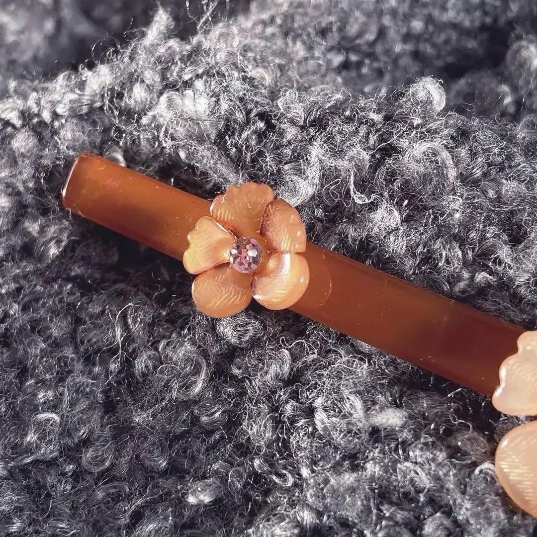 アレクサンドルドゥパリ フラワー バレッタ スワロフスキー オレンジ