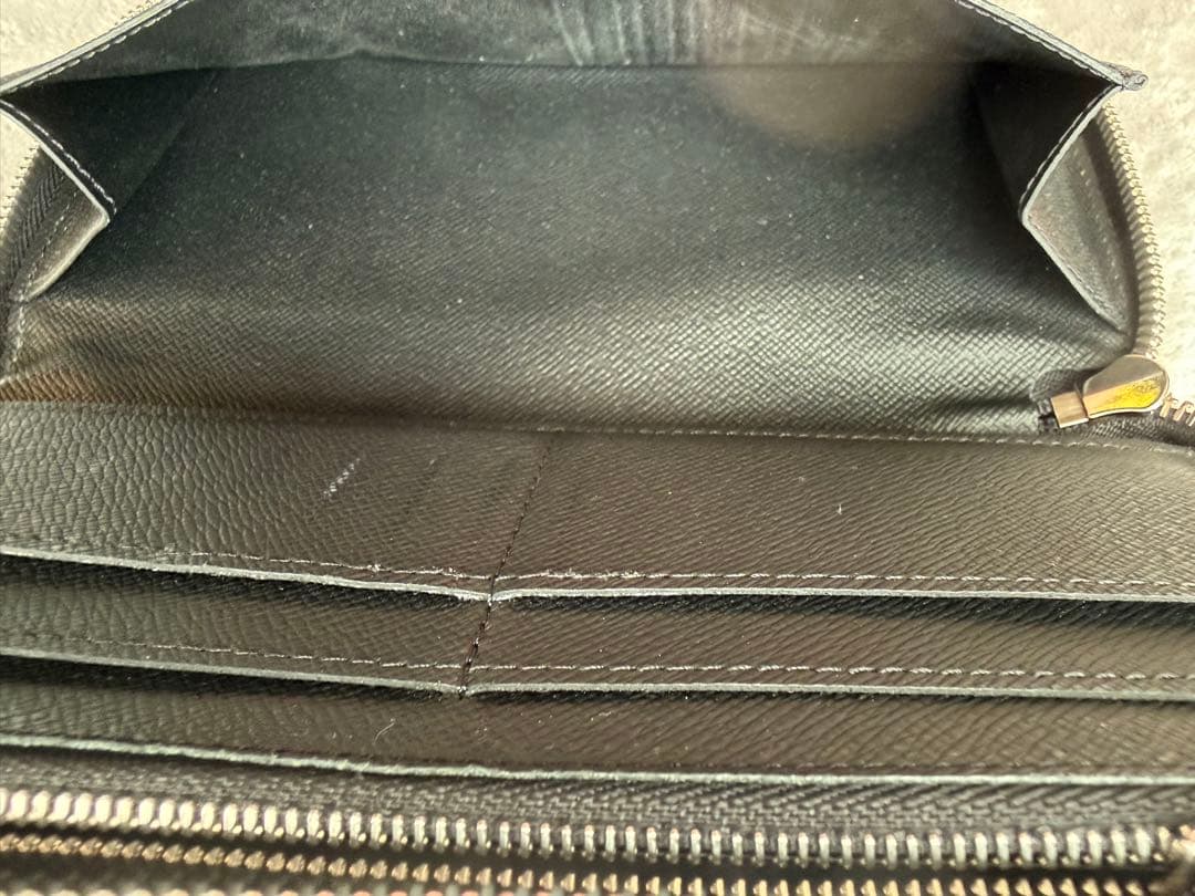 ルイヴィトンM30569 タイガ ジッピーウォレットヴェルティカル 長財布