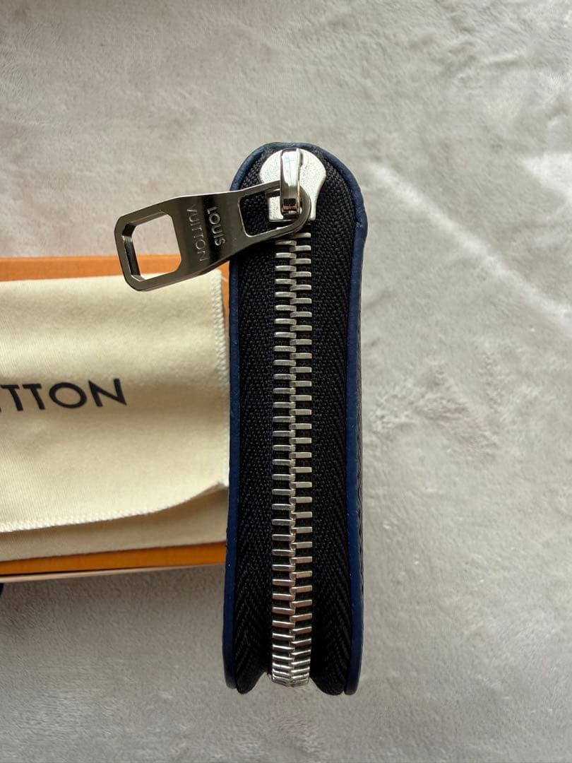 ルイヴィトンM30569 タイガ ジッピーウォレットヴェルティカル 長財布