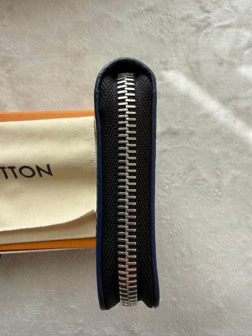 ルイヴィトンM30569 タイガ ジッピーウォレットヴェルティカル 長財布